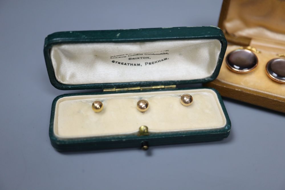 Six 9ct dress studs in two cases and one other cased set of six dress studs,